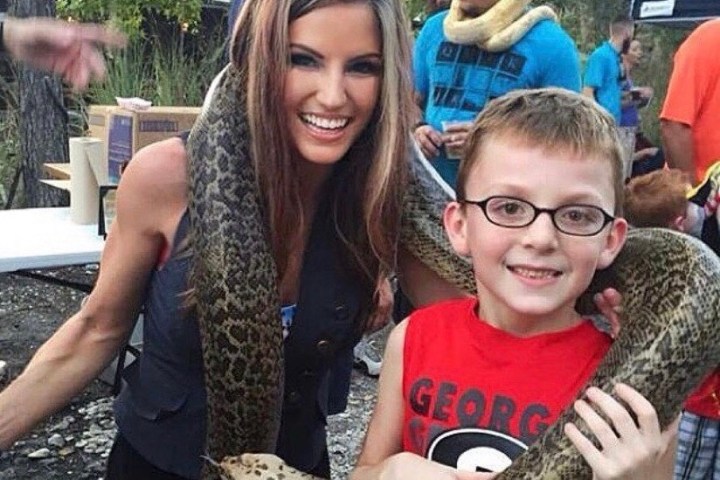 a group of people posing for the camera